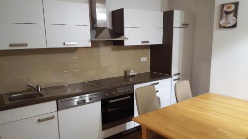 Η κουζίνα ή μικρή κουζίνα στο Apartments in Weissenhorn