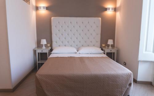 Ένα ή περισσότερα κρεβάτια σε δωμάτιο στο Fata34 Luxury B&B