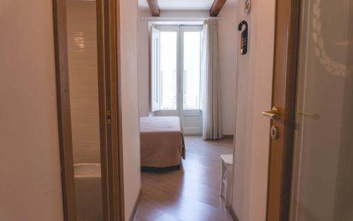 Ένα ή περισσότερα κρεβάτια σε δωμάτιο στο Fata34 Luxury B&B