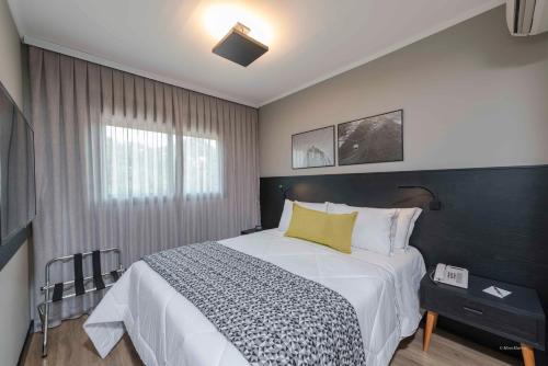 Postel nebo postele na pokoji v ubytování I am Design Hotel Campinas by Hotelaria Brasil