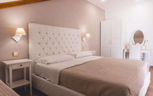 Ένα ή περισσότερα κρεβάτια σε δωμάτιο στο Fata34 Luxury B&B
