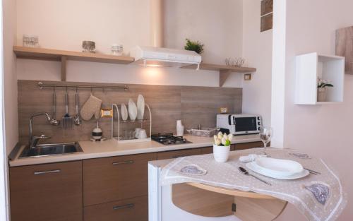 Η κουζίνα ή μικρή κουζίνα στο Fata34 Luxury B&B