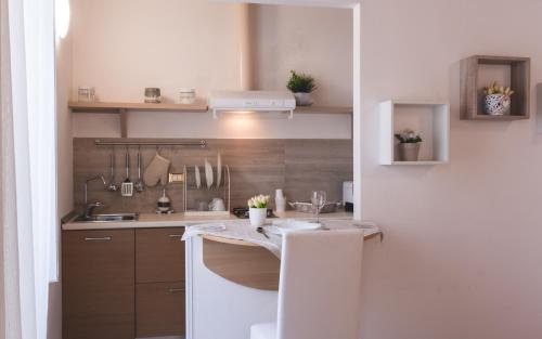 Kuchyň nebo kuchyňský kout v ubytování Fata34 Luxury B&B