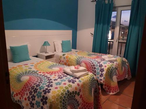 A bed or beds in a room at Apartamento Alagoinha