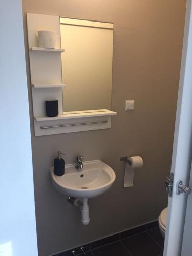 Bilik mandi di Apartments Choice