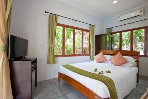 เตียงในห้องที่ Ardea Resort Pool Villa