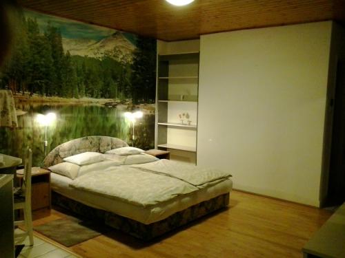 Ліжко або ліжка в номері Haus Kati