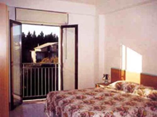 Säng eller sängar i ett rum på Aquamarine Residence
