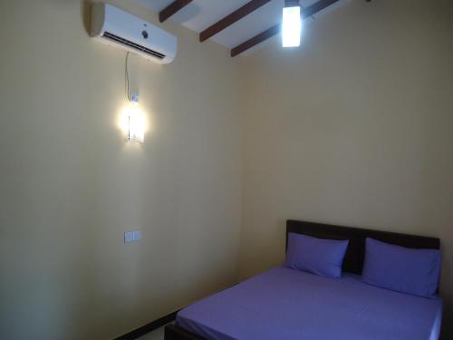 Postel nebo postele na pokoji v ubytování Amawin Resort