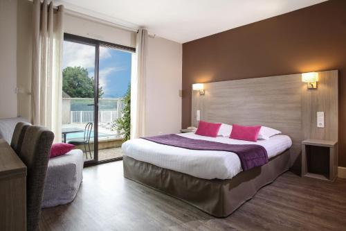 Cama o camas de una habitación en L'Oustal de Vézac