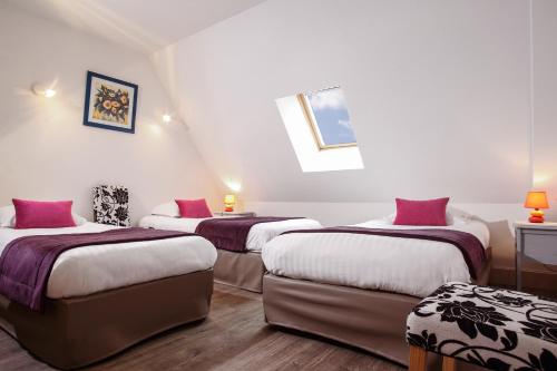 Cama o camas de una habitación en L'Oustal de Vézac