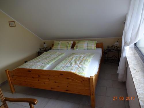 Letto o letti in una camera di Ferienwohnungen Stollhof