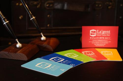 a group of colorful brochures sitting on a table at La'gent Hotel Tokyo Bay in Urayasu