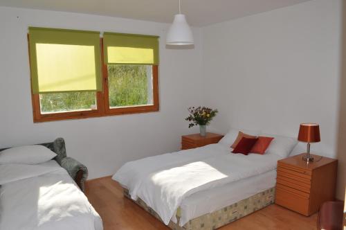 Ένα ή περισσότερα κρεβάτια σε δωμάτιο στο Country house Garden