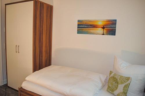 Postel nebo postele na pokoji v ubytování Villa Poseidon mit Balkon