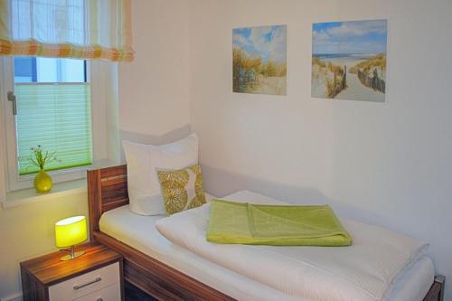 Postel nebo postele na pokoji v ubytování Villa Poseidon mit Balkon