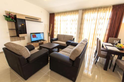 Zona de estar de Berg Apartments