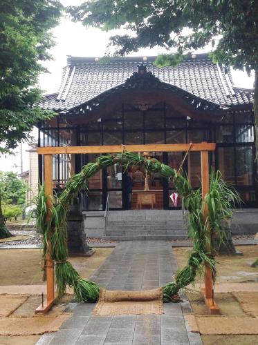 a bamboo archway in front of a gazebo at Town Hotel 41 in Kanazawa