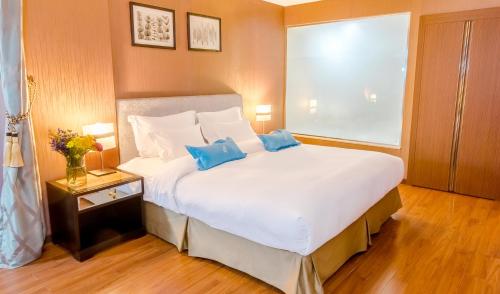 Katil atau katil-katil dalam bilik di The Blue Sky Hotel and Tower