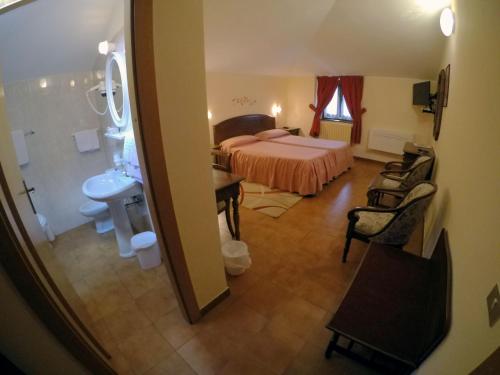 Koupelna v ubytování Hotel Ristorante Combolo