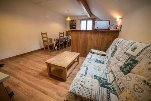 Prostor za sedenje u objektu Chalet les moineaux Appartements