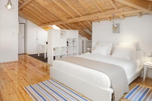 Postel nebo postele na pokoji v ubytování BO - Bolhão Apartments