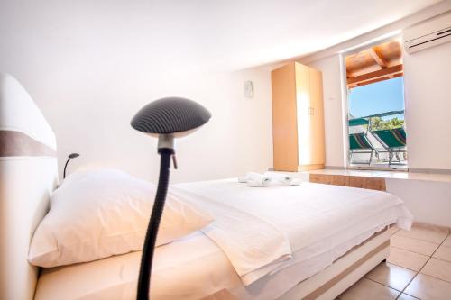 Una cama o camas en una habitación de Apartments Adriatic