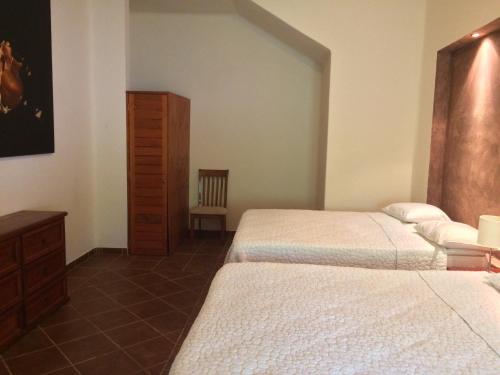 Letto o letti in una camera di La Villa Mexicana by Diving Prestige