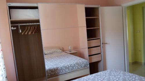 Posteľ alebo postele v izbe v ubytovaní Apartman Viktorija