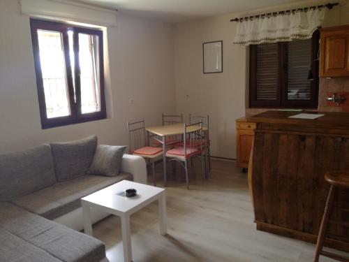 Et opholdsområde på Apartment Nela