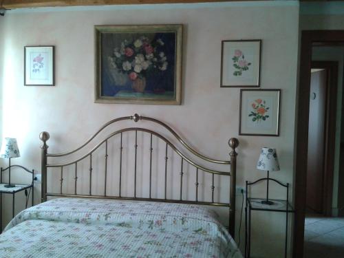 Ένα ή περισσότερα κρεβάτια σε δωμάτιο στο B&B Casa Francesca