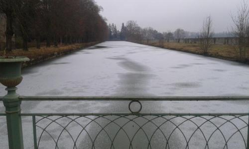 a frozen road with snow on it at Château De Serrigny in Ladoix Serrigny