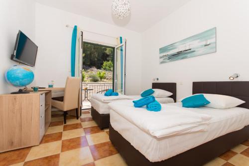 Postel nebo postele na pokoji v ubytování Guesthouse Vakans