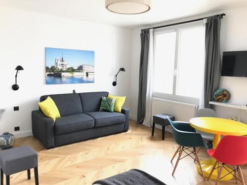 Area soggiorno di Appartement Seine et Marais