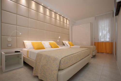 Un pat sau paturi într-o cameră la Residence Serenissima
