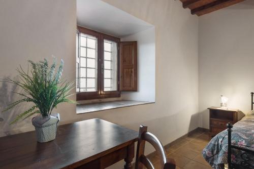 Postel nebo postele na pokoji v ubytování Agriturismo Casapasserini