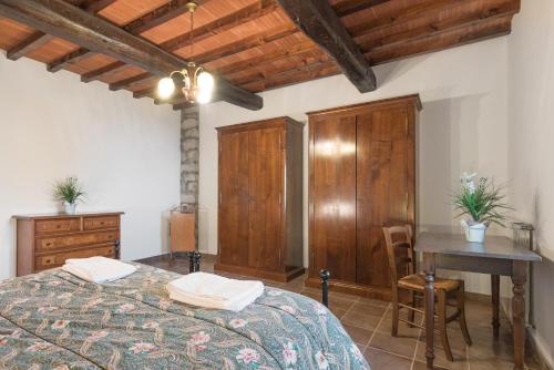 Postel nebo postele na pokoji v ubytování Agriturismo Casapasserini