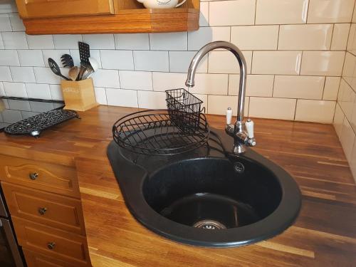 Kuchyň nebo kuchyňský kout v ubytování Flint Cottage