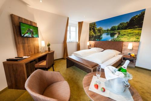 Postel nebo postele na pokoji v ubytování Hotel Hilker