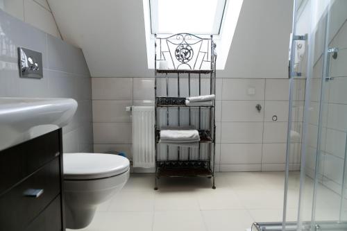 Koupelna v ubytování Mazurskie Apartamenty