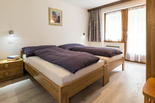 Postel nebo postele na pokoji v ubytování Haus Adora