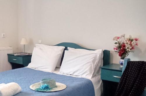 Un ou plusieurs lits dans un hébergement de l'établissement ANTONIOS Skopelos studios apartments