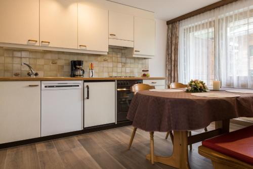 Kuchyň nebo kuchyňský kout v ubytování Haus Adora