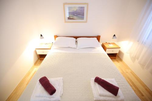 Säng eller sängar i ett rum på Villa Goga