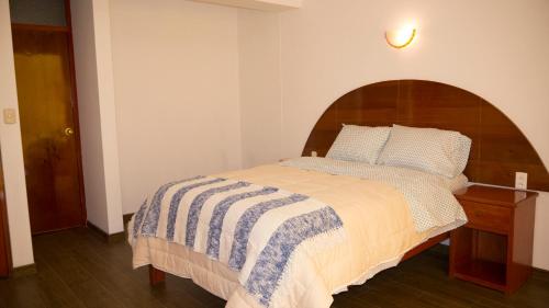 Postel nebo postele na pokoji v ubytování Hotel Shelter