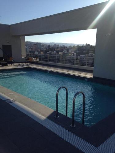 Piscina di Apartamento Boutique Viña del Mar o nelle vicinanze