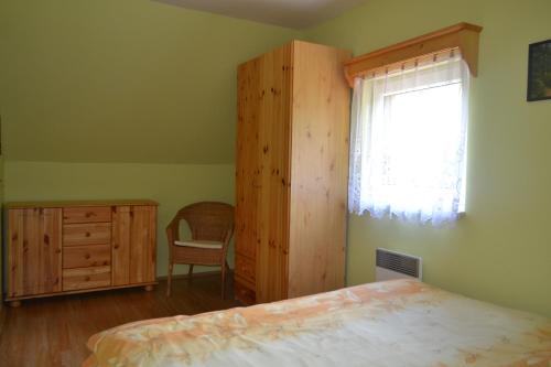 Postel nebo postele na pokoji v ubytování Chaty pod Knížecí, Trojanovice
