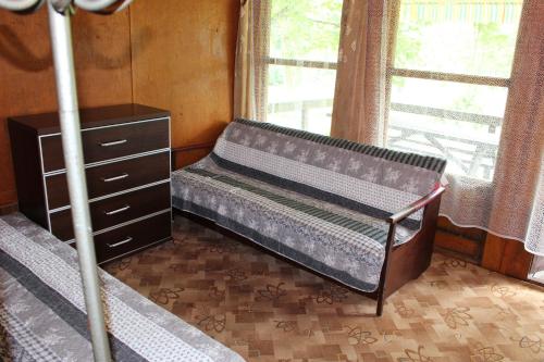 Postel nebo postele na pokoji v ubytování Domek Letniskowy Brożówka