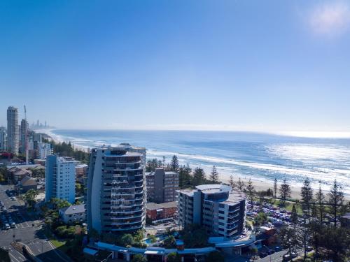 an aerial view of a city and the ocean at Ambience on Burleigh Beach in Gold Coast