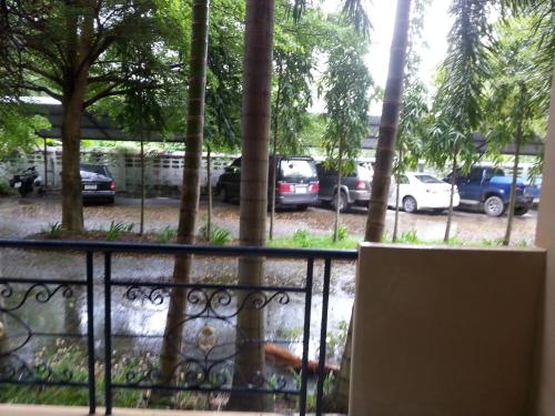 a view from the balcony of a parking lot at C.A.P Mansion in Phuket Town
